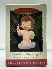 Holding Blue Bird #8 Camellia - MARYS ANGELS ...