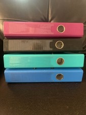 Four 2-inch Bindertek binders blue, turquoise, black, dark rose . Used.