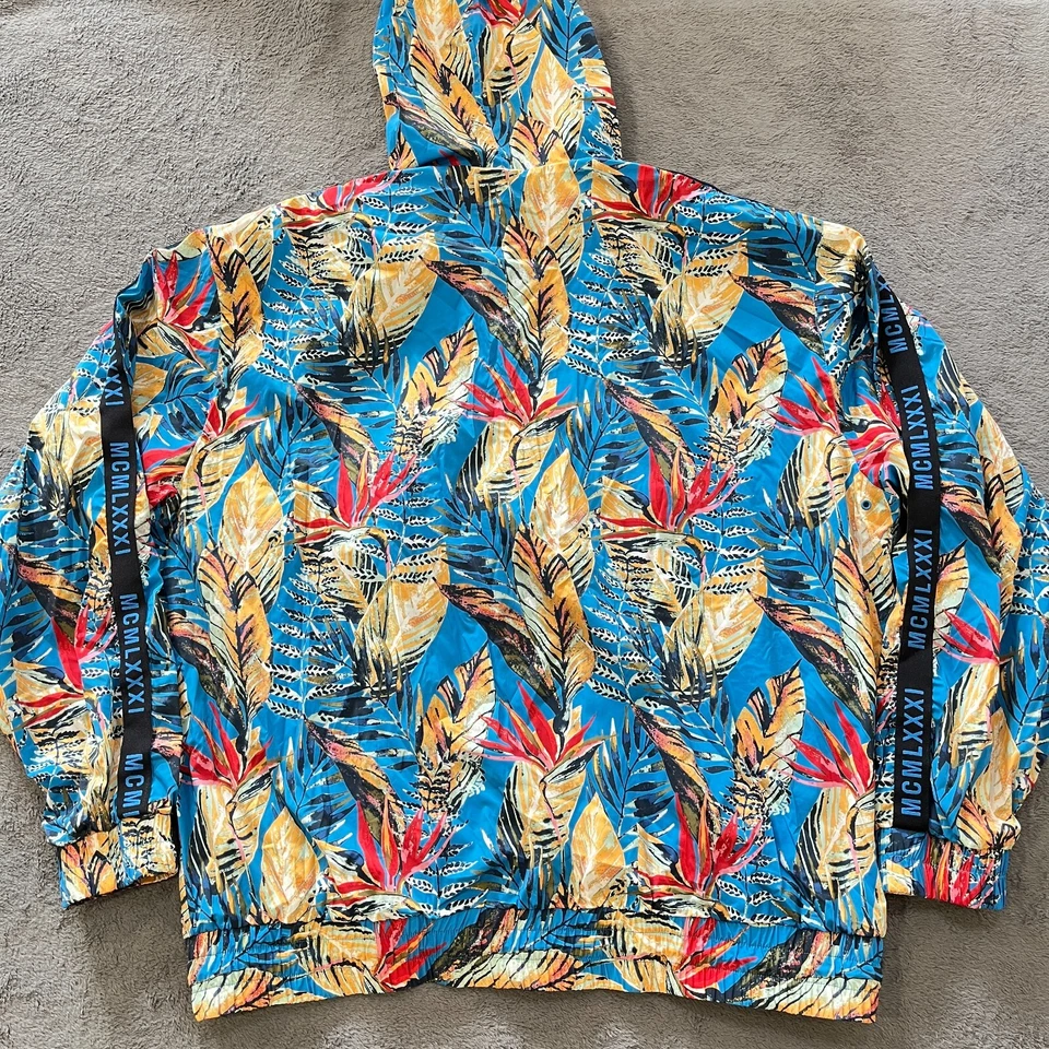 Chaqueta cortavientos Guess media cremallera azul hojas naturales multicolor para hombre talla XXL Foto 2 de 4