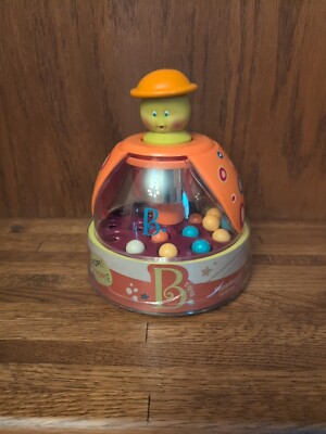 B. Toys Poppitoppy   Spinning Top Ball Popper Toy for Baby & Toddler
