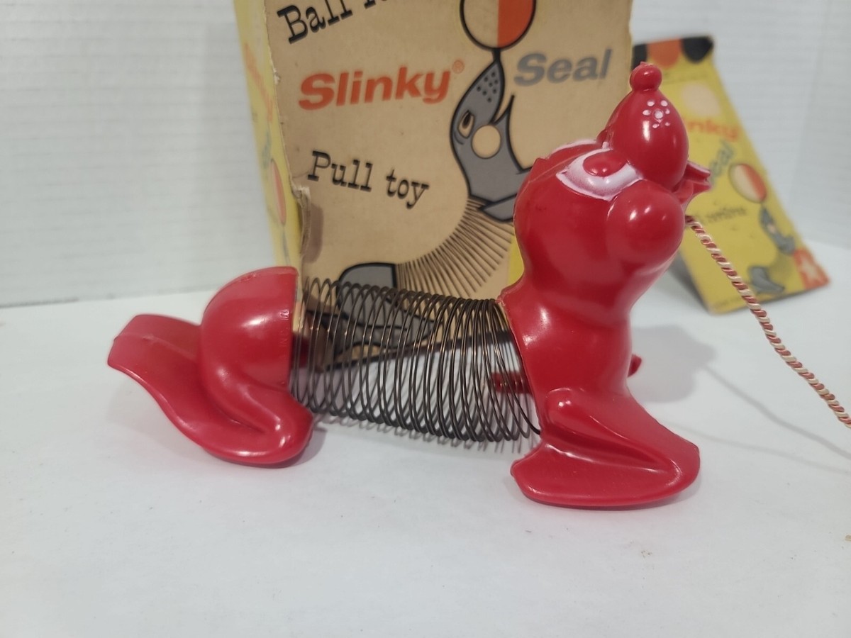 1960s James Original Slinky Seal Pull Toy James Industries Inc