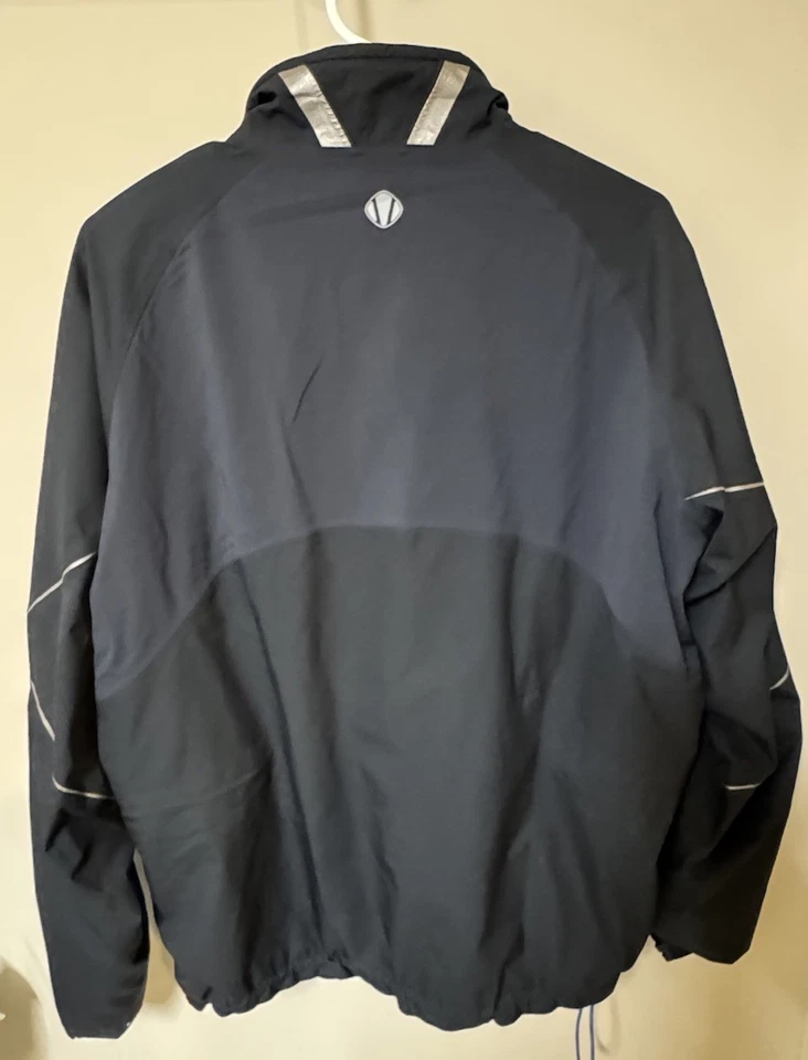 Chaqueta de golf Sunice Hurricane Ultimate V2 para hombre talla mediana Gore-Tex negra azul Foto 2 de 4