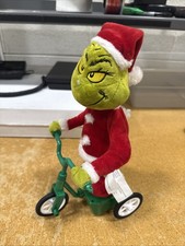 Peluche animado de Navidad Dr. Seuss El Grinch en un triciclo probado funcionando