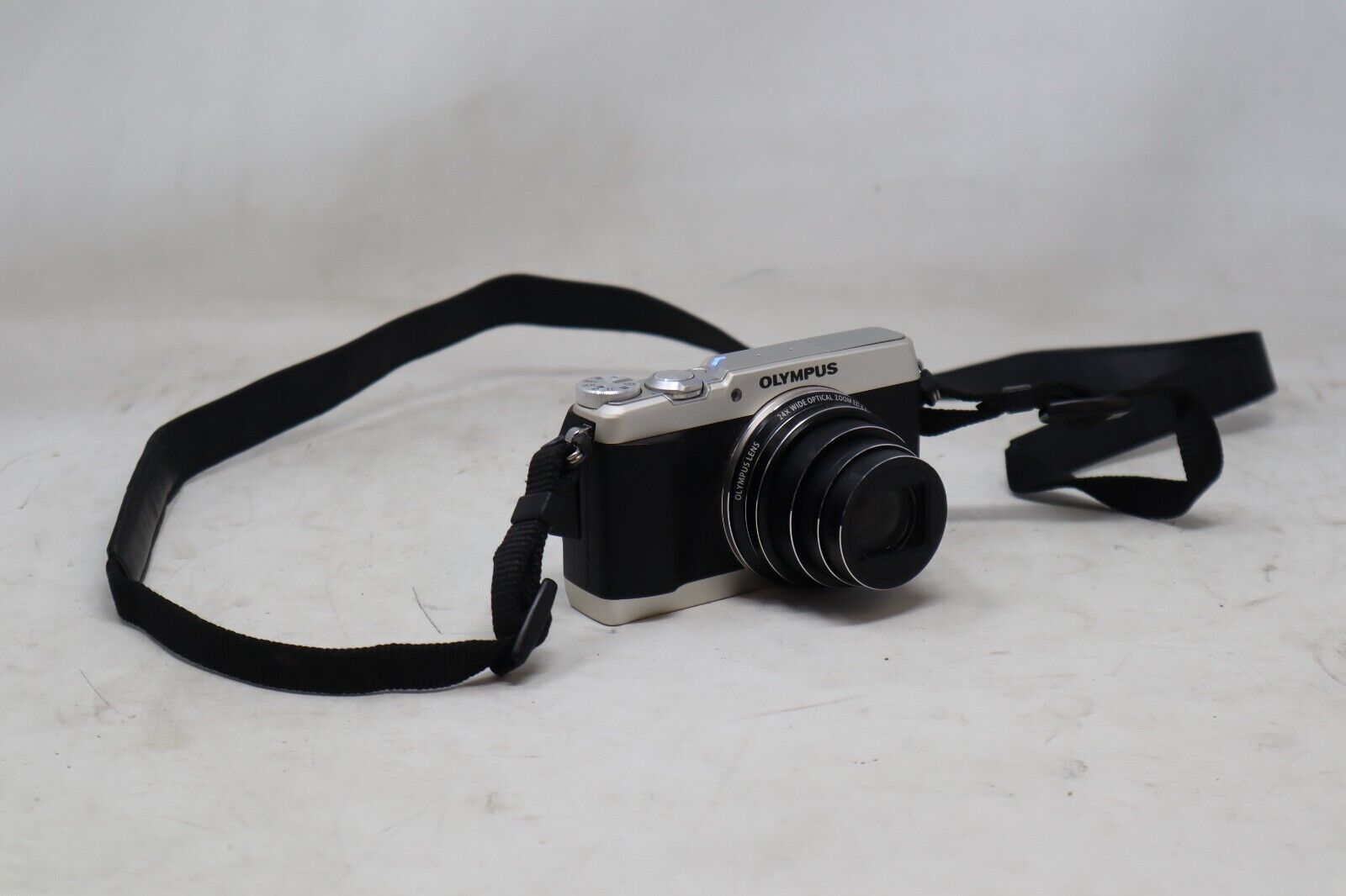 Olympus Stylus SH-1 Digital Camera | With A/C Adapter | Low-Light Flash | Studio