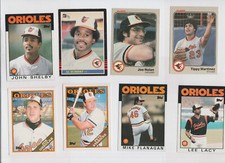 (20) 1983 1985 TOPPS ORIOLES RC LOT ($50) MARTINEZ FLANAGAN JOHNSON RIPKEN NOLAN