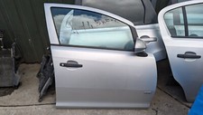 VAUXHALL CORSA D 2008 FRONT RIGHT DRIVER SIDE DOOR IN SILVER (NO MIRROR)