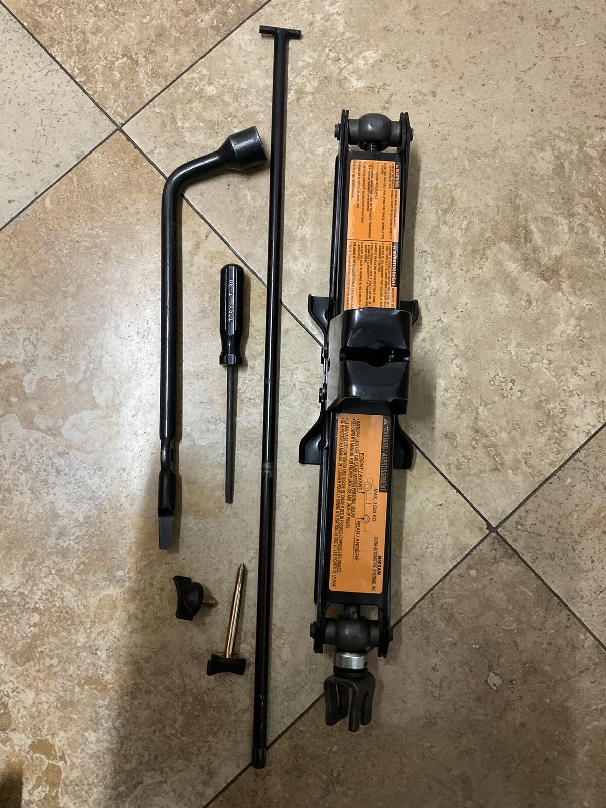 20002004 Nissan Xterra Tire Scissor Jack with tool OEM eBay