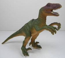 Dinosaur Green  Orange Velociraptor 4.5" Long Plastic Animal Figure China 2009