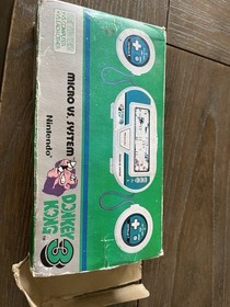 New Game & Watch Donkey Kong 3 Handheld by NINTENDO (Box is damaged and warped)