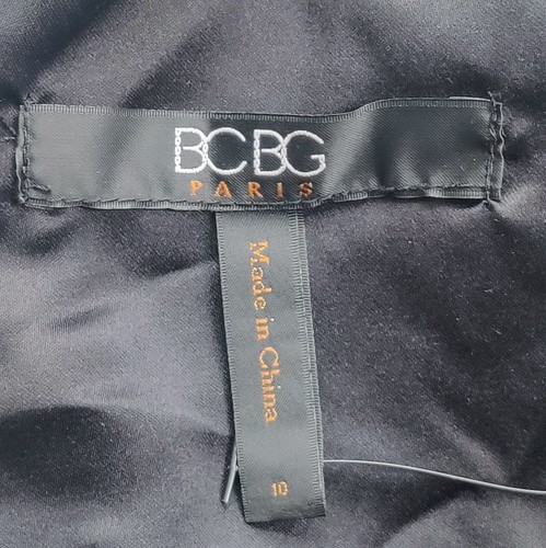 BCBG PARIS Kleid mit Ösen und Schößchen Größe 10 Etui ärmellos schwarz Damen neu mit Etikett - Bild 7 von 12
