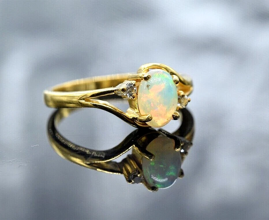 Lab created 2024 opal engagement ring