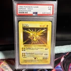 Pokémon 1999 Zapdos Base Set 16/102 Holo Rare English 1999 PSA 7