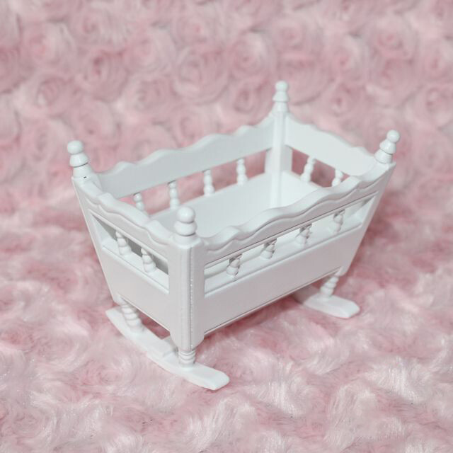 white wooden cot