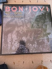 JON BON JOVI SIGNED SLIPPERY WHEN WET VINYL AUTOGRAPH ALBUM LP