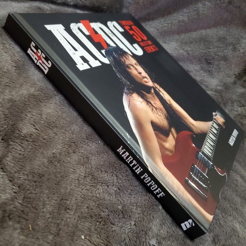 AC/DC - Through 50 Milestone Events - Hard Cover NEW - Foto 7 di 8