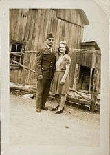 WW2 Era Photo American GI Standing By Barn With Sister