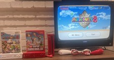 Red Nintendo Wii Console Bundle: Super Mario Bros, Mario Party 8, + Controllers