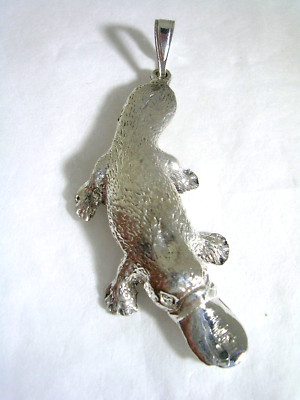 PLATYPUS PENDANT WITH A HIGH POLISHED FUR LIKE FINISH IN