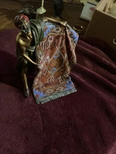 Bronze Sculpture Arab Man Showing Carpet