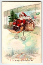 Santa Claus In Plane Christmas Postcard Saint Nick In Airship Airplane Bi-Plane