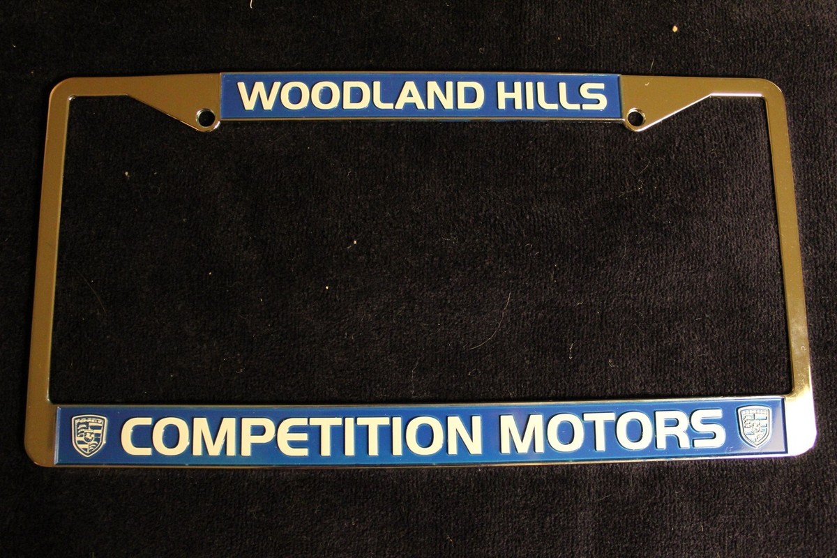 COMPETITION MOTORS POR Dealership License Plate Frame. Blue. Metal