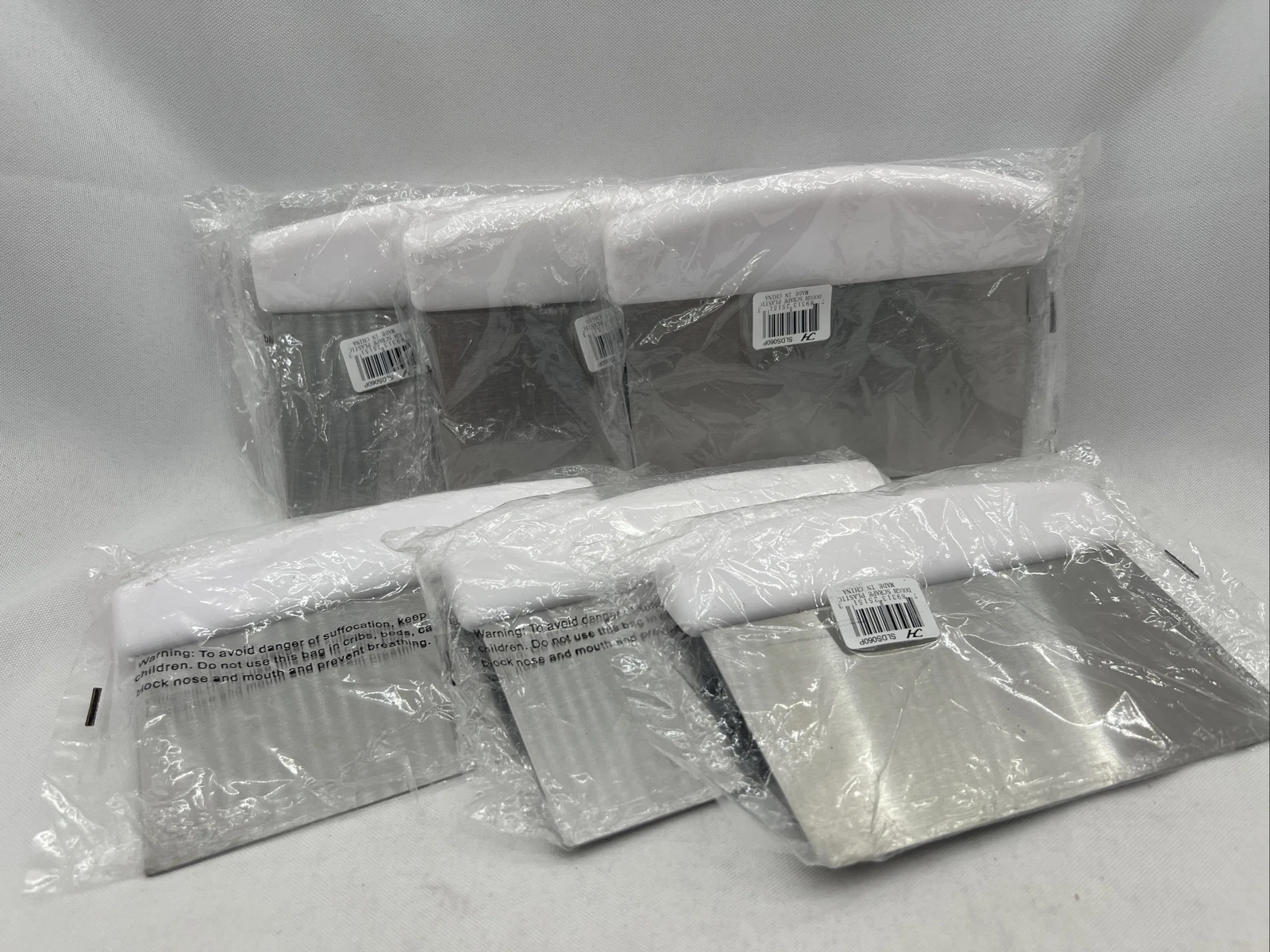 Lot of 6 TrueCraftware - 6" x 4" inch Stainless Steel Dough Scraper with White.
Opens in a new windo