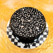 Turntable  record weight. Musical Notes engraved quality record stabilizer. 