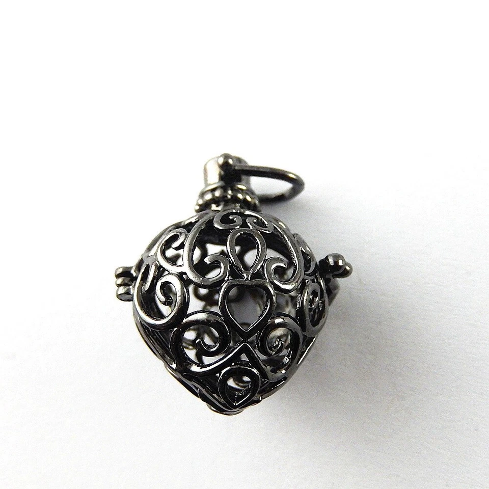 2 PIEZAS Medallón Colgante Corazón Floral Huecado Negro Bola Mexicana Dije Llamador Ángel Foto 4 de 4