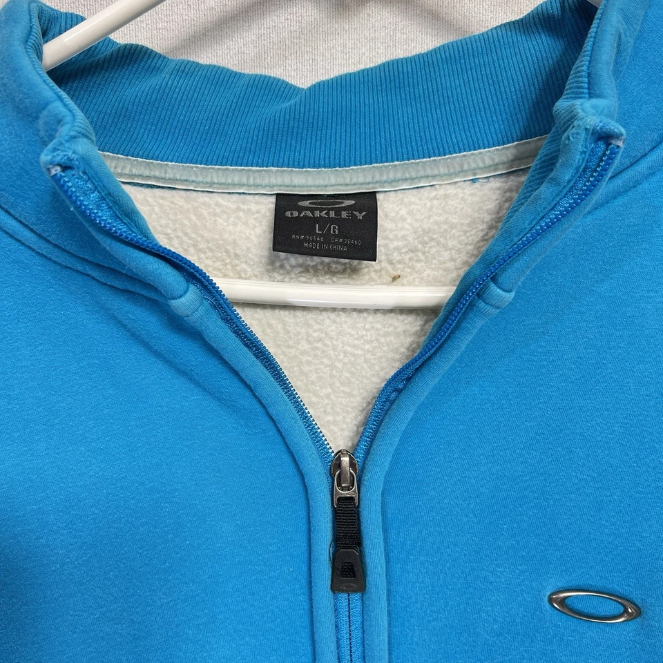Sudadera OAKLEY Vintage Para Hombre Grande Forrada de Vellón Azul Cremallera Completa Bolsillos Suéter Foto 3 de 4
