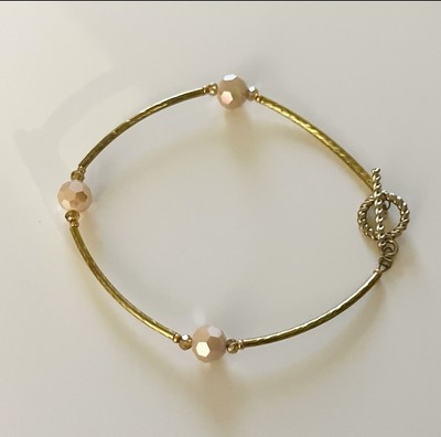 Light Orange And Gold Shiny Beaded Bracelet With Toggle Clasp