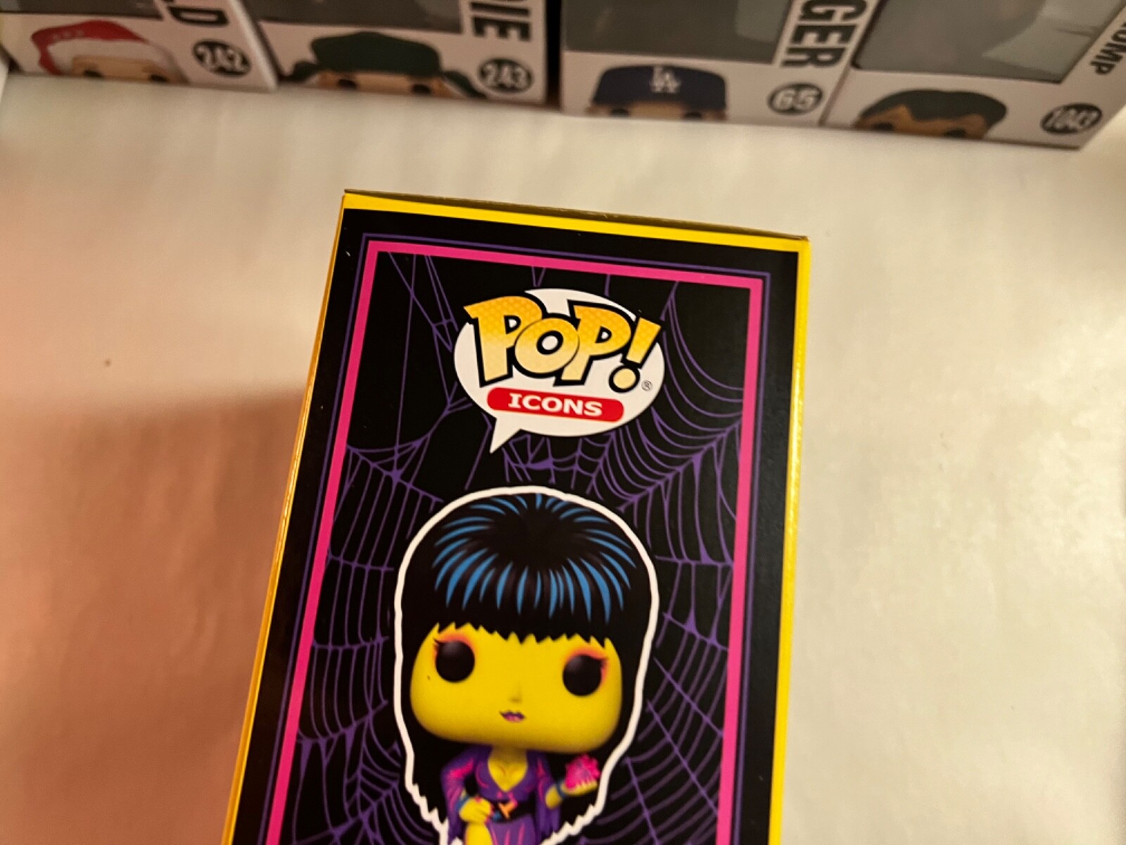 Elvira Black Light Entertainment Earth 68 Funko Pop