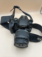 Canon Eos Rebel XS 10.1 MP DSLR Camera, with EF-S 18-55mm f/3.5-5.6 II Lens