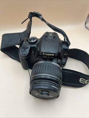 Canon Eos Rebel XS 10.1 MP DSLR  Camera, with EF-S 18-55mm f/3.5-5.6 II Lens