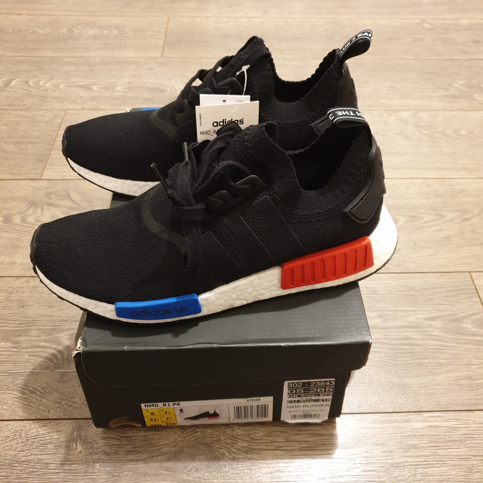 nmd r1 core black core black lush red
