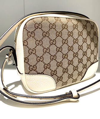 Gucci GG Supreme Monogram White Messenger Wallet in a bag