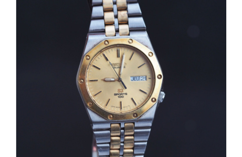 Montre Seiko SQ Sport 100 doré l'éclat du style chic masculin