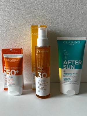 Clarins Sonnencreme-Set (Sun Care Cream + Sun Care Oil Mist + Shower Gel)