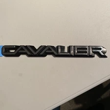 1988-1990 Chevy Cavalier Rear End Panel "Cavalier" Emblem G.M.#20717278