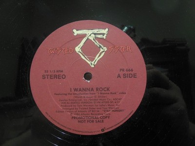 Twisted Sister – I Wanna Rock / We're Not Gonna Take It, 12