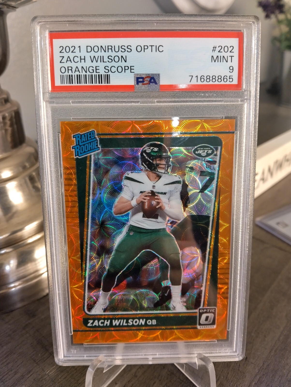 2021 Donruss Optic Orange Scope Prizm #202 Zach Wilson Jets RC Rookie /79 PSA 9