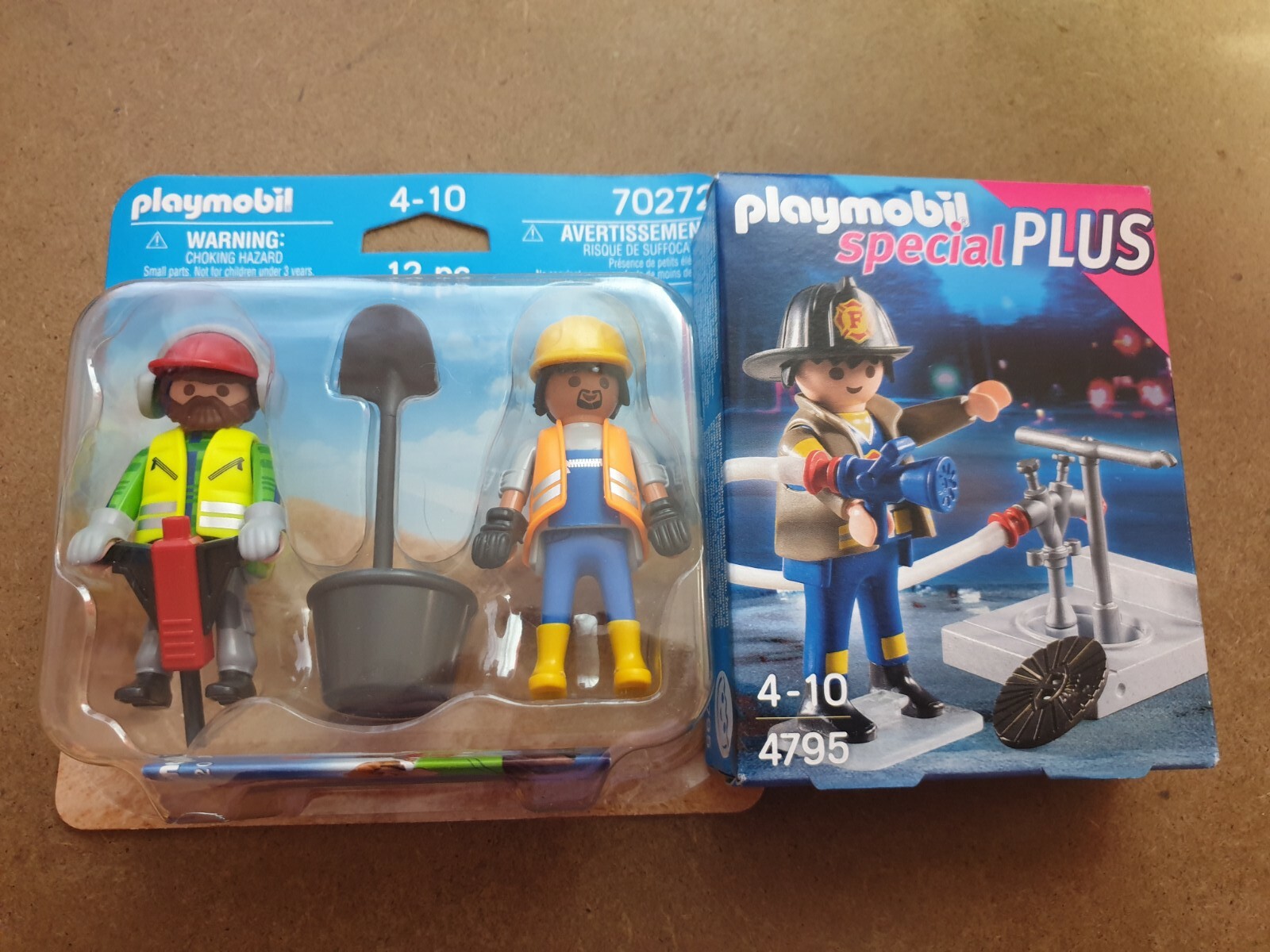 Playmobil 70272 Construction workers and 4795 Fireman with hose figure. New.