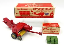 New Holland Model Hayliner Baler w/ Thrower and Bales Advance Products in Boxes