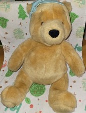 Gund/Disney Winnie the Pooh plush bear with blue nightcap