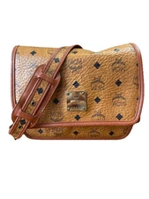 MCM Visetos Cognac coated canvas and leather messenger bag.
