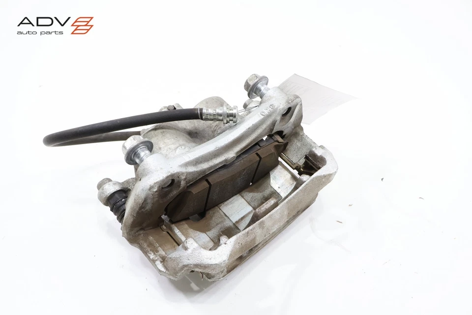 Pinza de freno lado pasajero delantero derecho Nissan Frontier 2008-2025 OEM Foto 4 de 4