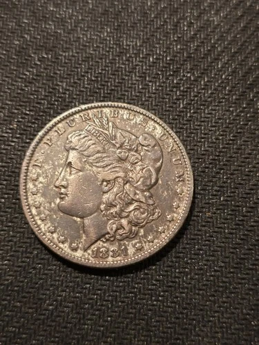 1881-O $1 Morgan Silver Dollar GOOD (dark looking and may have been cleaned)