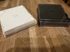 11 CD Slimline Jewel Cases - 6 Black, 5 White
