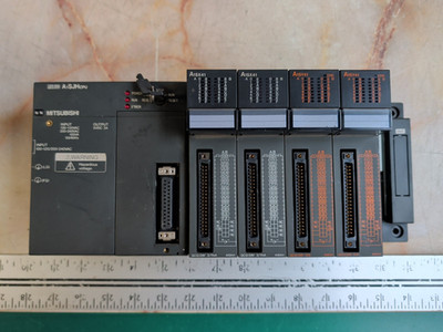 MITSUBISHI MELSEC A1SJHCPU RACK W/ (2) A1SX41 (2) A1SY41 MODULES
