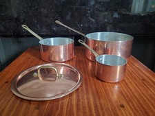 Lot of three small Vintage copper sauce pans.