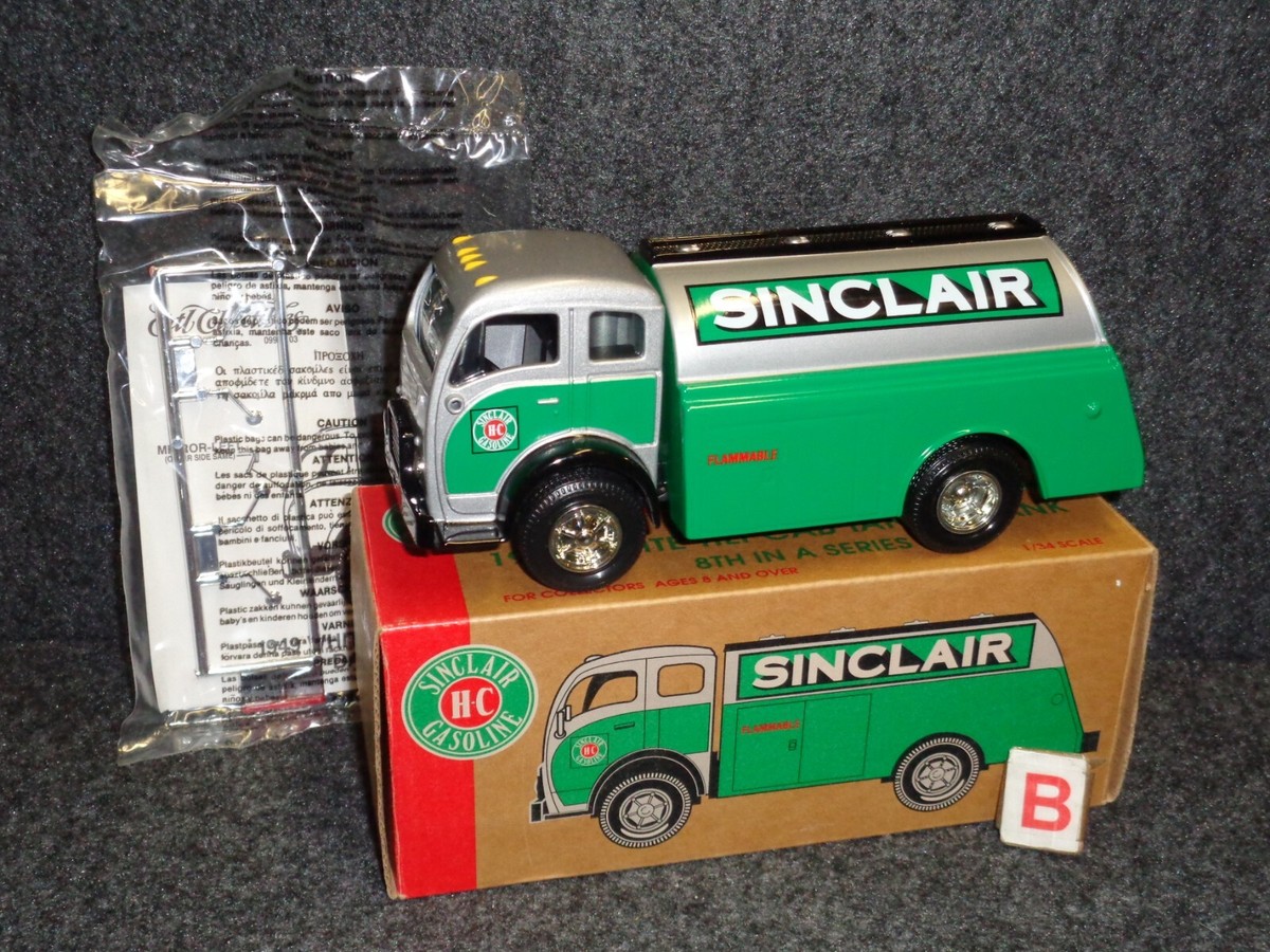 SINCLAIR OIL 1949 WHITE TILT CAB TANKER TRUCK ERTL DIECAST COIN